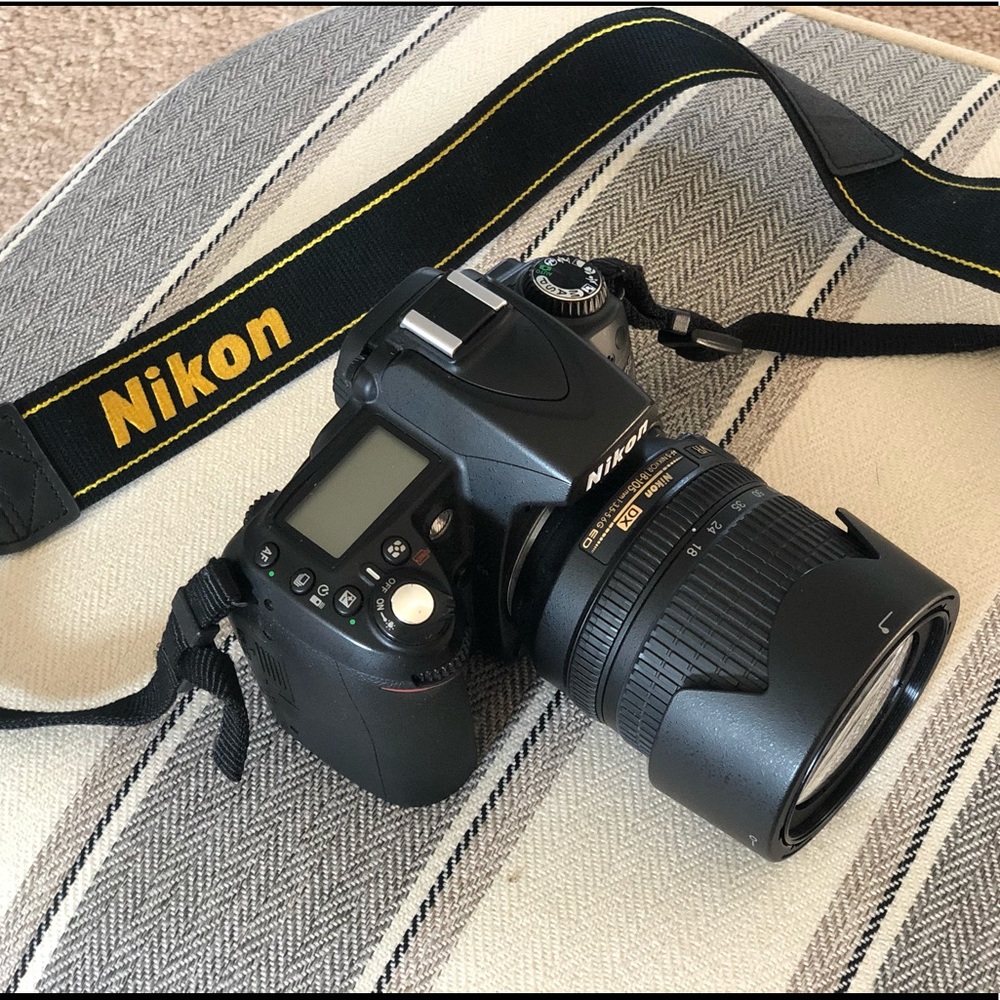 Nikon D90 with 18-105mm, rare use, like new